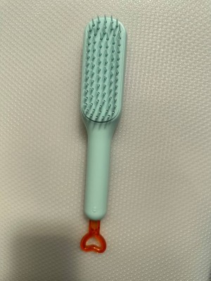 Расческа Cool Stretch Shrink Comb самоочищающаяся для волос